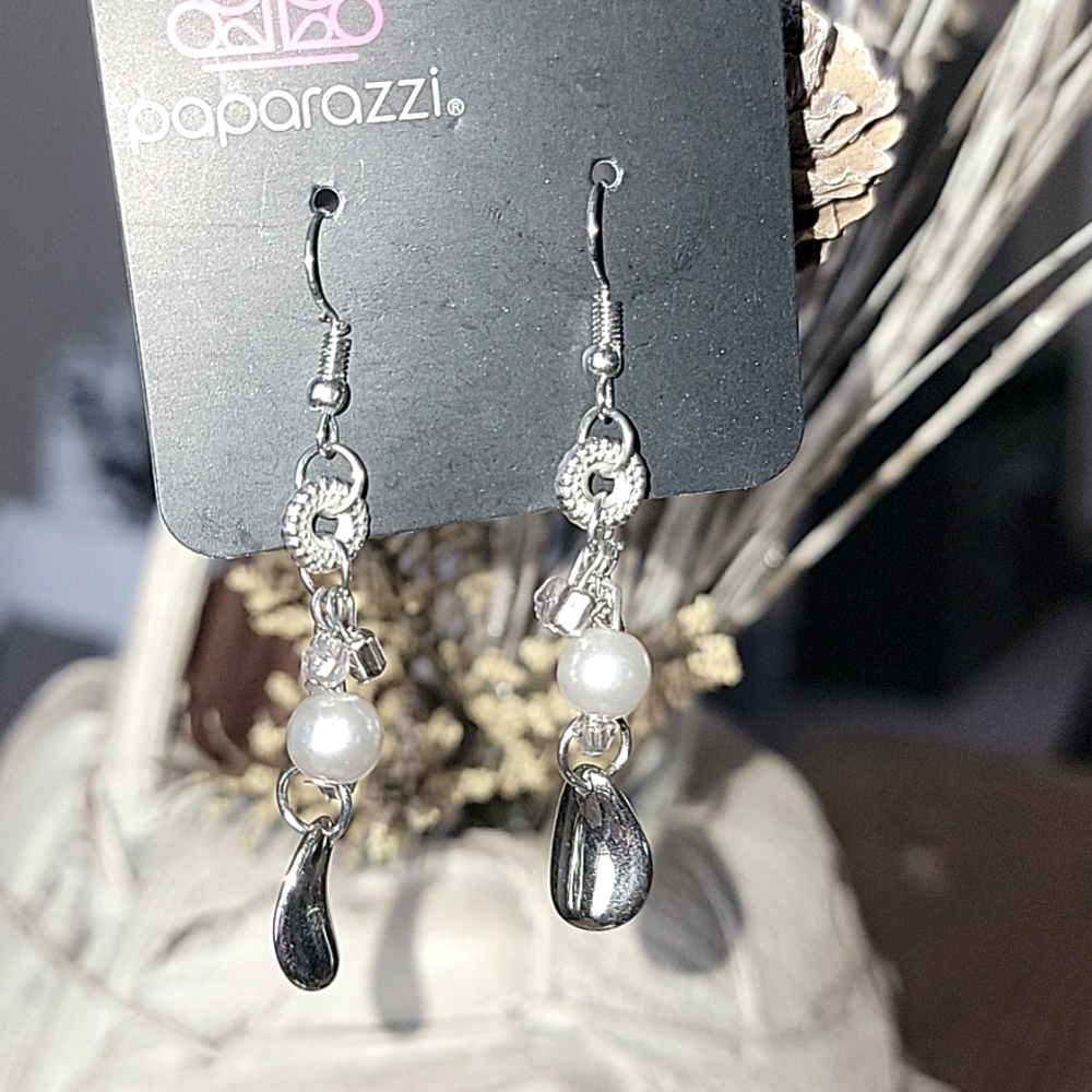 Silver and white dangle earrings